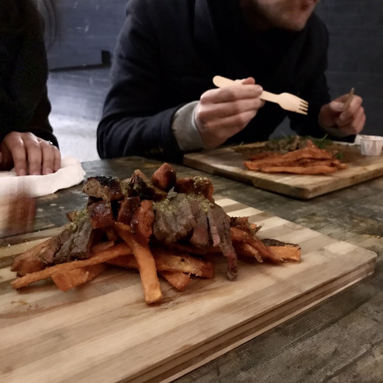 steak slices with sweet potato fries