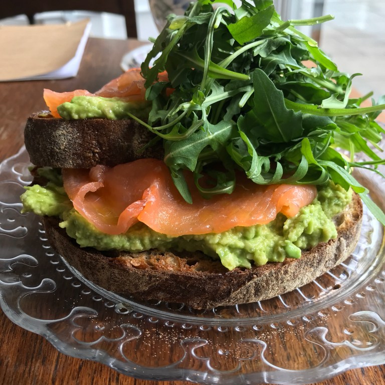 Avo on organic sourdough & rye toast + smoked salmon + wild rocket