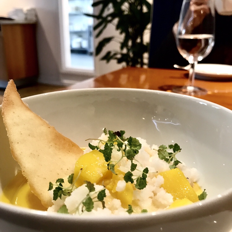 MANGO PANNA COTTA Pineapple & spiced rum syrup. Coconut snow.