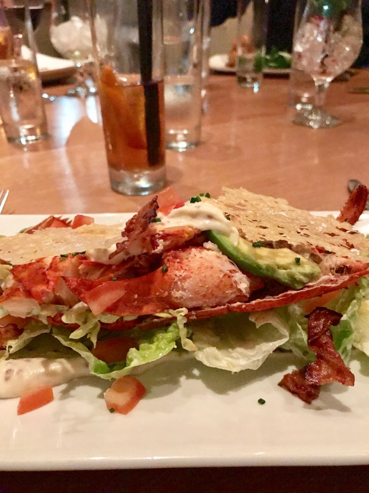 half freshly prepared lobster. Crispy bacon. Parmesan crisp. Avocado Caesar (£7 surcharge)