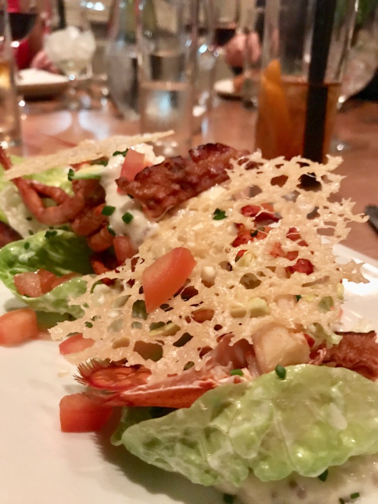 half freshly prepared lobster. Crispy bacon. Parmesan crisp. Avocado Caesar