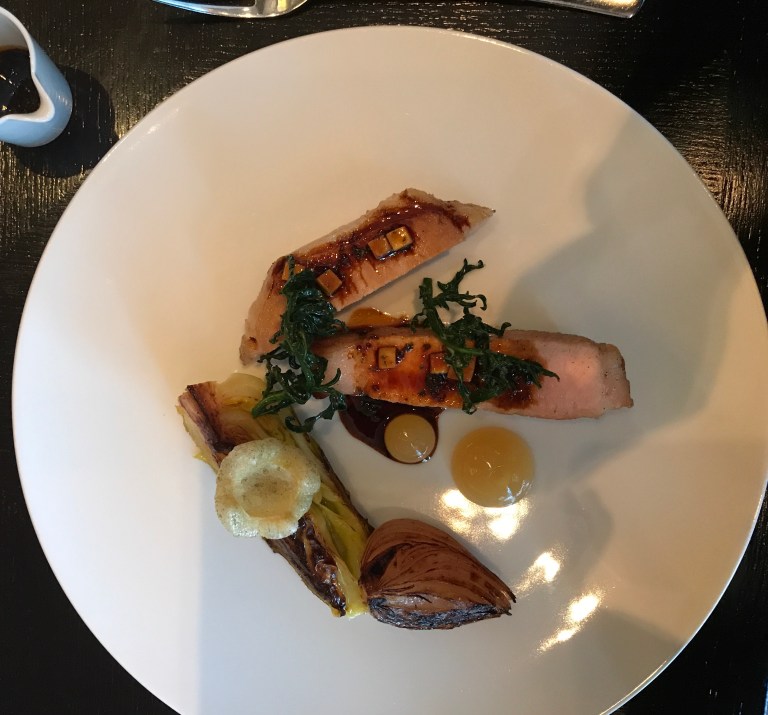 Roast Iberico Pork Chop (c. 1820) Smoked bispi cabbage, pickled onions, ice cider & Robert sauce