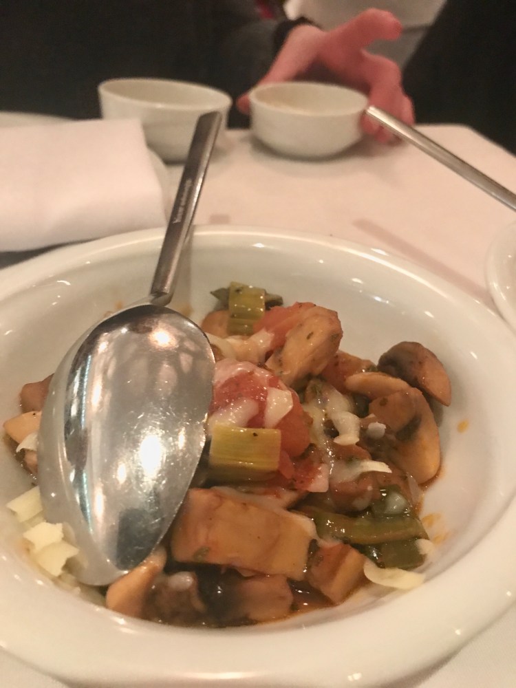 Mantur - Mushrooms sauteed with garlic, onions and tomatoes, topped with kashar cheese