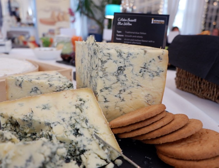 Blocks of Colston Bassett Blue Stilton with digestive biscuits