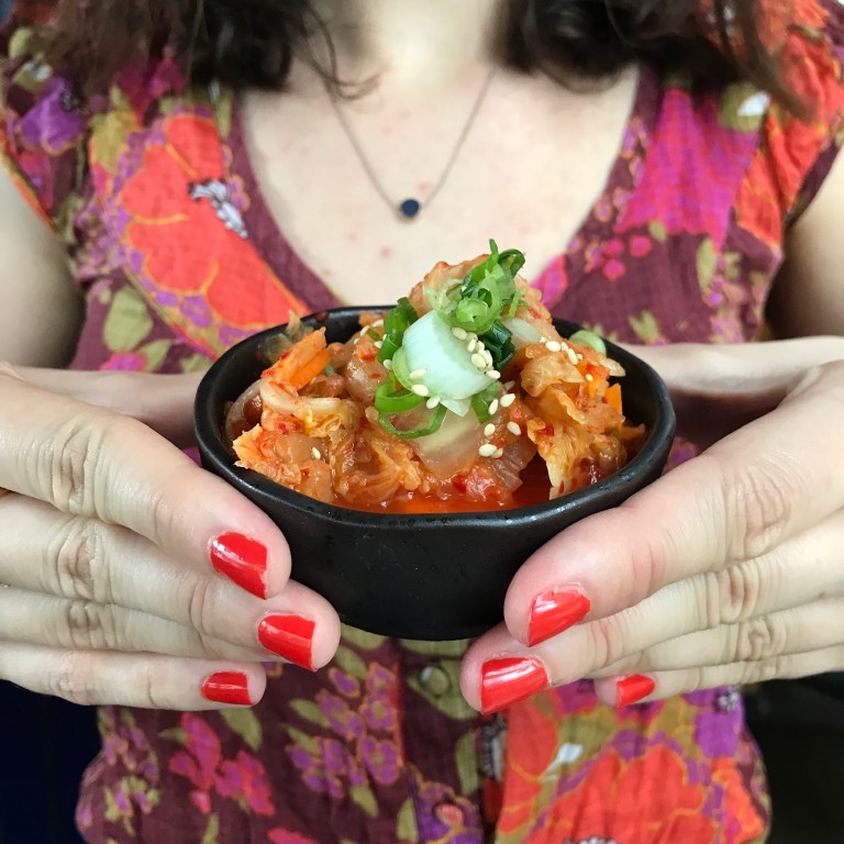 Claire holding the kimchi