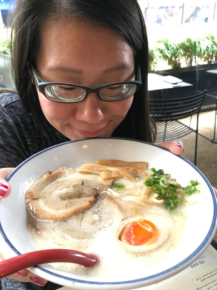 Me holding my Tonkotsu Ramen up close that I can smell the broth